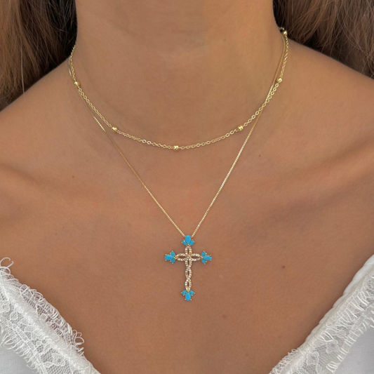 Cadena cruz turquesa